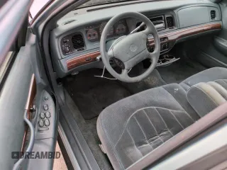 1996 Mercury Grand Marquis GS with VIN 2MELM74W5TX653873, listed as a Copart auction lot 74659254 with 86,589 mi miles and Salvage Title. Bid and sale history available at DreamBid. Image 8.