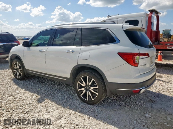 2020 Honda Pilot Touring 7-Passenger with VIN 5FNYF6H69LB018905, listed as a Copart auction lot 61209685 with 61,637 mi miles and Salvage title. Bid and sale history available at DreamBid. Image 2.