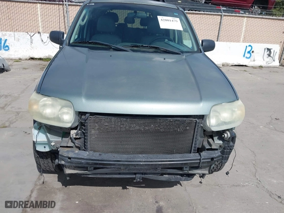 2007 Ford Escape Hybrid with VIN 1FMCU59H37KA92464, listed as a IAAI auction lot 42001479 with 159,147 mi miles. Bid and sale history available at carsss.com. Image 6.