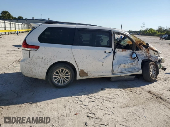 2014 Toyota Sienna XLE with VIN 5TDYK3DC4ES457160, listed as a Copart auction lot 48921425 with 0 mi miles and Salvage Title. Bid and sale history available at carsss.com. Image 3.
