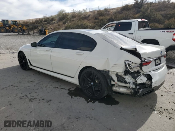 2016 BMW 7 Series 750i xDrive z VIN WBA7F2C50GG421120, wystawiony jako Copart lot #75668694 z przebiegiem 83 178 mil mil oraz Szkoda całkowita • Salvage title. Historia ofert i sprzedaży dostępna na DreamBid. Obrazek 2.