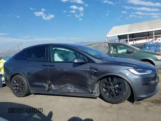 2023 Tesla Model X with VIN 7SAXCBE50PF378548, listed as a IAAI auction lot 41698357 with Not Provided miles and . Bid and sale history available at DreamBid. Image 13.