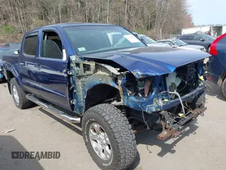 2014 Toyota Tacoma with VIN 3TMLU4EN0EM153558, listed as a IAAI auction lot 41964890 with 140,864 mi miles and . Bid and sale history available at DreamBid. Image 1.