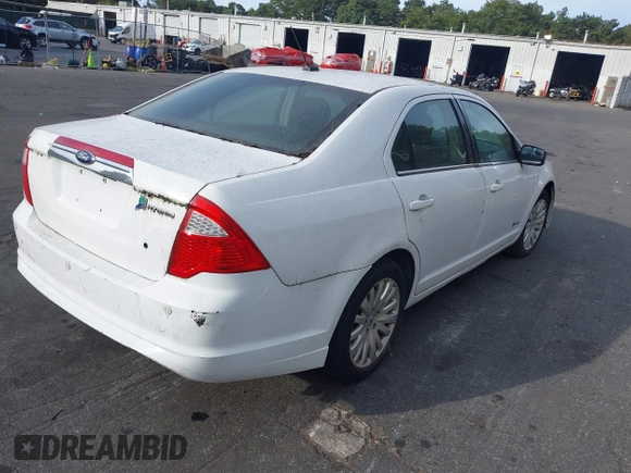 2012 Ford Fusion Hybrid with VIN 3FADP0L31CR380494, listed as a IAAI auction lot 40411832 with 81,452 mi miles and . Bid and sale history available at DreamBid. Image 4.