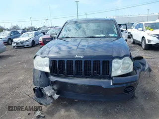 2008 Jeep Grand Cherokee Laredo with VIN 1J8GR48K48C119836, listed as a IAAI auction lot 42114083 with 129,352 mi miles. Bid and sale history available at carsss.com. Image 12.