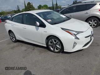 2018 Toyota Prius Two z VIN JTDKARFU4J3062506, wystawiony jako IAAI lot #41920400 z przebiegiem 94 196 mil mil oraz . Historia ofert i sprzedaży dostępna na DreamBid. Obrazek 1.