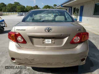 2010 Toyota Corolla with VIN 2T1BU4EE4AC427018, listed as a Copart auction lot 48974735 with 59,543 mi miles and Salvage Title. Bid and sale history available at carsss.com. Image 6.