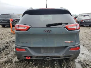 2014 Jeep Cherokee Trailhawk with VIN 1C4PJMBB9EW251749, listed as a Copart auction lot 49712915 with 94,289 mi miles and Clean Title. Bid and sale history available at carsss.com. Image 6.