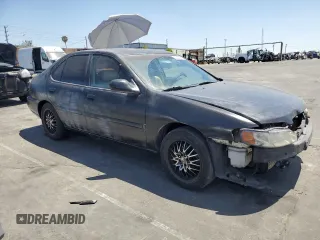 2000 Nissan Altima GXE with VIN 1N4DL01A0YC151534, listed as a Copart auction lot 87019454 with 233,012 mi miles and Clean Title. Bid and sale history available at carsss.com. Image 4.
