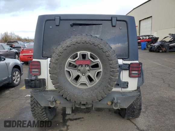 2015 Jeep Wrangler Unlimited Rubicon with VIN 1C4BJWFGXFL693566, listed as a Copart auction lot 46628765 with 70,128 mi miles and Salvage Title. Bid and sale history available at carsss.com. Image 6.