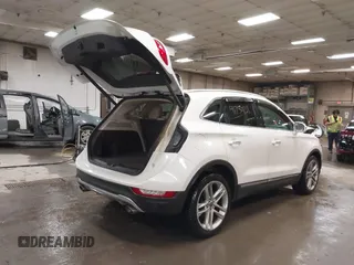 2019 Lincoln MKC Reserve with VIN 5LMCJ3D9XKUL17812, listed as a IAAI auction lot 41730211 with 56,716 mi miles and . Bid and sale history available at DreamBid. Image 4.