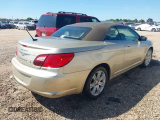 2010 Chrysler Sebring Touring z VIN 1C3BC5ED3AN172492, wystawiony jako IAAI lot #42186030 z przebiegiem 203 041 mil mil oraz . Historia ofert i sprzedaży dostępna na DreamBid. Obrazek 4.