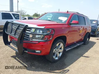 2015 Chevrolet Tahoe LT with VIN 1GNSKBKC6FR628355, listed as a IAAI auction lot 42159743 with 95,730 mi miles and . Bid and sale history available at DreamBid. Image 2.