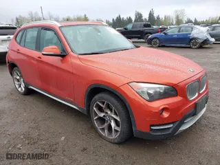 2014 BMW X1 xDrive28i with VIN WBAVL1C56EVY19385, listed as a IAAI auction lot 41997290 with 86,549 mi miles. Bid and sale history available at carsss.com. Image 1.