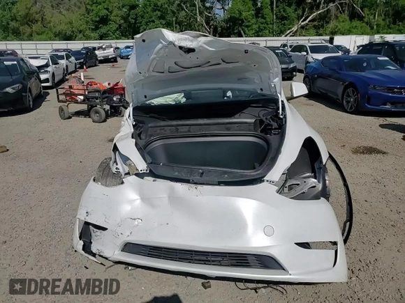 2024 Tesla Model Y Performance with VIN 7SAYGDEF4RF064210, listed as a Copart auction lot 52498805 with 14,318 mi miles and Non Repairable. Bid and sale history available at DreamBid. Image 12.