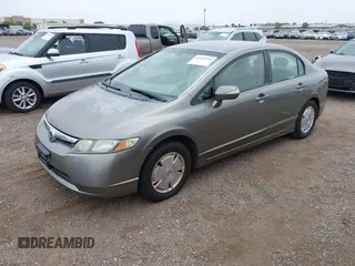 2006 Honda Civic z VIN JHMFA36286S006836, wystawiony jako IAAI lot #42324244 z przebiegiem 217 417 mil mil oraz . Historia ofert i sprzedaży dostępna na DreamBid. Obrazek 18.