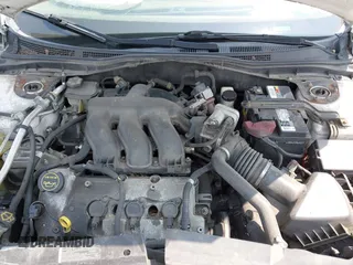 2008 Mercury Milan Premier with VIN 3MEHM02158R633388, listed as a IAAI auction lot 42390045 with 158,332 mi miles and . Bid and sale history available at DreamBid. Image 10.