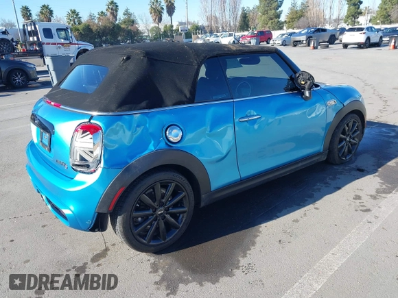 2019 MINI Convertible Cooper S with VIN WMWWG9C50K3J31011, listed as a IAAI auction lot 41332186 with 82,105 mi miles. Bid and sale history available at carsss.com. Image 4.