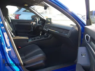 2023 Honda Civic Sedan Sport with VIN 2HGFE2F50PH545696, listed as a IAAI auction lot 41146953 with 24,678 mi miles. Bid and sale history available at carsss.com. Image 5.