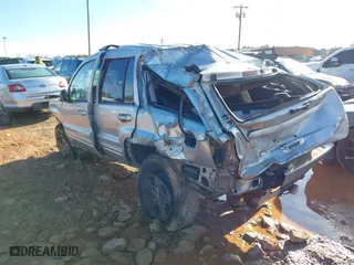 2004 Jeep Grand Cherokee Limited with VIN 1J4GW58S14C102826, listed as a IAAI auction lot 41081734 with 116,950 mi miles. Bid and sale history available at carsss.com. Image 3.