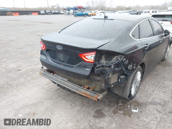 2016 Ford Fusion Energi SE Luxury with VIN 3FA6P0PU2GR322430, listed as a IAAI auction lot 42038508 with 114,980 mi miles. Bid and sale history available at carsss.com. Image 6.