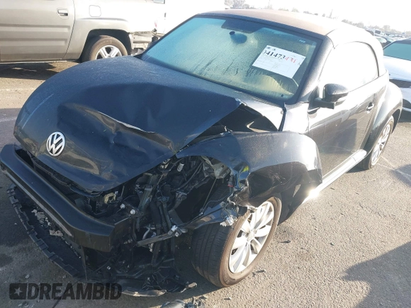 2019 Volkswagen Beetle S with VIN 3VW5DAAT3KM511269, listed as a IAAI auction lot 41473431 with 34,757 mi miles and . Bid and sale history available at DreamBid. Image 18.