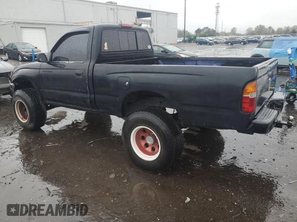 1999 Toyota Tacoma with VIN 4TAPM62N3XZ485783, listed as a Copart auction lot 52459485 with 294,237 mi miles and Clean Title. Bid and sale history available at DreamBid. Image 2.