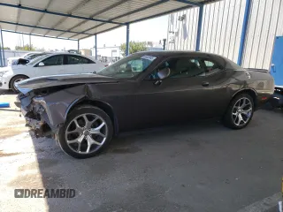 2015 Dodge Challenger SXT Plus with VIN 2C3CDZBG1FH901046, listed as a Copart auction lot 63850845 with 51,495 mi miles and Salvage title. Bid and sale history available at DreamBid. Image 1.