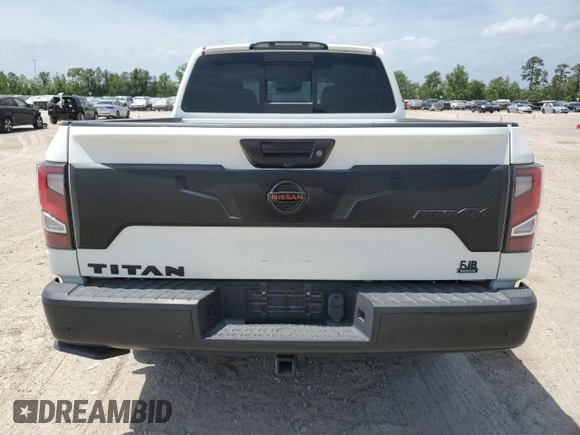 2021 Nissan Titan Pro-4X z VIN 1N6AA1ED0MN533801, wystawiony jako Copart lot #53301215 z przebiegiem 41 991 mil mil oraz Szkoda całkowita • Salvage title. Historia ofert i sprzedaży dostępna na DreamBid. Obrazek 6.