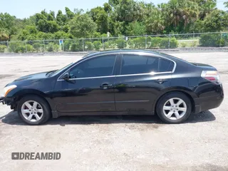 2009 Nissan Altima SL with VIN 1N4AL21E59N549166, listed as a IAAI auction lot 42464028 with 170,253 mi miles and . Bid and sale history available at DreamBid. Image 14.