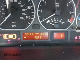 2005 BMW 3 Series 330i with VIN WBAEV53425KM41897, listed as a IAAI auction lot 41818391 with 155,731 mi miles. Bid and sale history available at carsss.com. Image 7.
