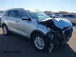 2017 Kia Sorento LX V6 with VIN 5XYPG4A59HG300752, listed as a IAAI auction lot 41657282 with 144,882 mi miles. Bid and sale history available at carsss.com. Image 1.