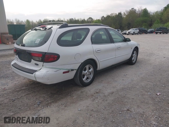 2003 Ford Taurus SE z VIN 1FAFP58S63A158422, wystawiony jako IAAI lot #41933813 z przebiegiem 71 990 mil mil oraz . Historia ofert i sprzedaży dostępna na DreamBid. Obrazek 4.