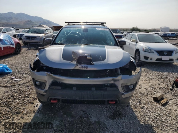 2019 Jeep Compass Trailhawk with VIN 3C4NJDDB9KT668858, listed as a Copart auction lot 58603645 with 74,226 mi miles and Salvage title. Bid and sale history available at DreamBid. Image 5.
