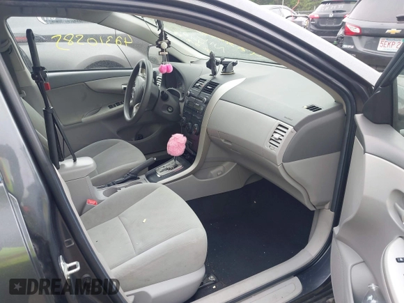 2010 Toyota Corolla with VIN 2T1BU4EEXAC317560, listed as a IAAI auction lot 42310585 with 150,589 mi miles and . Bid and sale history available at DreamBid. Image 5.