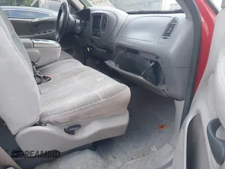 1997 Ford F-150 with VIN 1FTDX08W2VKC17809, listed as a IAAI auction lot 42541525 with 143,963 mi miles and . Bid and sale history available at DreamBid. Image 5.
