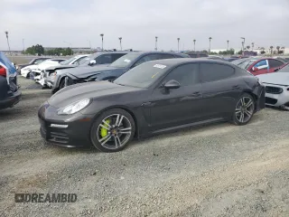 2015 Porsche Panamera S E-Hybrid with VIN WP0AD2A73FL040550, listed as a Copart auction lot 60873135 with 86,547 mi miles and Salvage title. Bid and sale history available at DreamBid. Image 1.