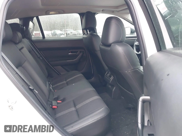 2024 Mazda CX-50 S Premium with VIN 7MMVABDM8RN162809, listed as a IAAI auction lot 41511222 with 12,516 mi miles and . Bid and sale history available at DreamBid. Image 8.