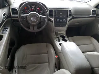 2012 Jeep Grand Cherokee Laredo with VIN 1C4RJEAG1CC316703, listed as a Copart auction lot 52128105 with 203,896 mi miles and Salvage Title. Bid and sale history available at carsss.com. Image 8.