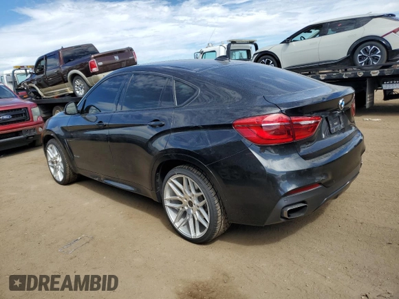 2015 BMW X6 xDrive50i with VIN 5UXKU6C5XF0F94498, listed as a Copart auction lot 67776034 with 106,579 mi miles and Non Repairable. Bid and sale history available at carsss.com. Image 2.