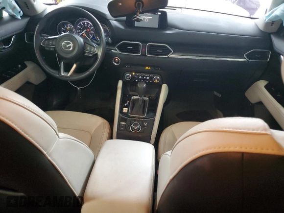2018 Mazda CX-5 Grand Touring with VIN JM3KFBDM5J0454026, listed as a Copart auction lot 60672315 with 12,292 mi miles and Salvage title. Bid and sale history available at DreamBid. Image 8.