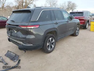 2023 Jeep Grand Cherokee 4xe with VIN 1C4RJYB68PC633388, listed as a IAAI auction lot 41032229 with NaN miles. Bid and sale history available at carsss.com. Image 4.