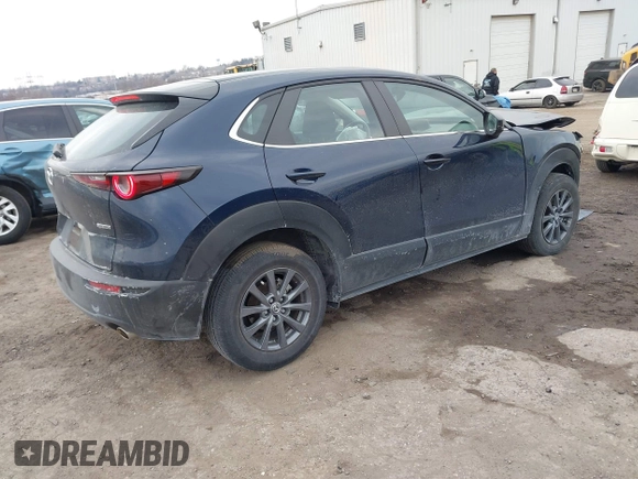 2022 Mazda CX-30 S with VIN 3MVDMBAL8NM411739, listed as a IAAI auction lot 41668265 with 34,964 mi miles and . Bid and sale history available at carsss.com. Image 4.
