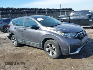 2020 Honda CR-V LX with VIN 2HKRW2H20LH607675, listed as a IAAI auction lot 41645896 with 64,973 mi miles. Bid and sale history available at carsss.com. Image 1.