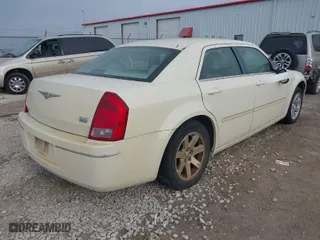 2007 Chrysler 300 Touring with VIN 2C3LA53G07H658041, listed as a IAAI auction lot 42014510 with 169,478 mi miles. Bid and sale history available at carsss.com. Image 4.