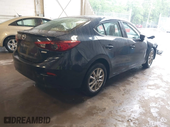 2016 Mazda 3 i Touring with VIN JM1BM1V74G1306843, listed as a IAAI auction lot 42358429 with 168,412 mi miles and . Bid and sale history available at DreamBid. Image 4.