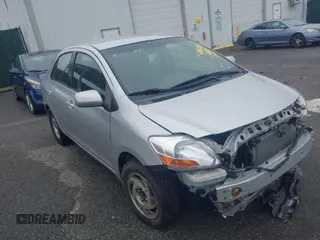 2009 Toyota Yaris with VIN JTDBT903694047246, listed as a IAAI auction lot 41961204 with 154,430 mi miles. Bid and sale history available at carsss.com. Image 1.
