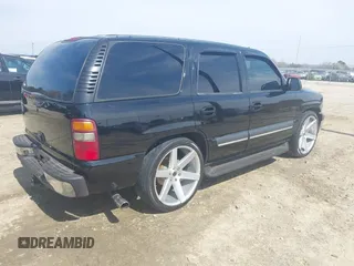 2003 Chevrolet Tahoe LT with VIN 1GNEC13Z73J322783, listed as a IAAI auction lot 41773868 with 259,710 mi miles and . Bid and sale history available at DreamBid. Image 4.