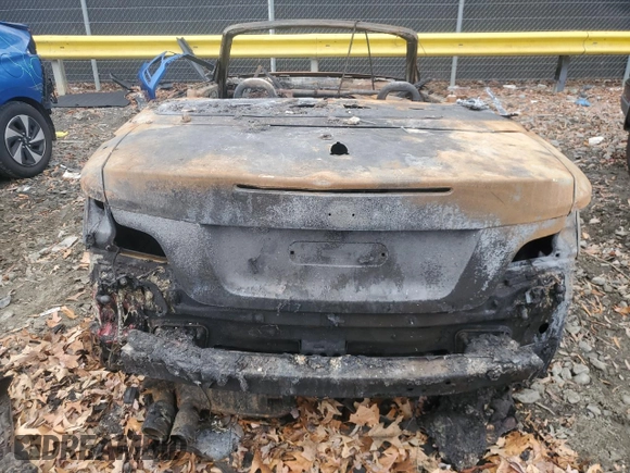 2011 BMW 1 Series 135i with VIN WBAUN7C52BVM23944, listed as a Copart auction lot 84061924 with Not provided miles and Salvage title. Bid and sale history available at DreamBid. Image 6.
