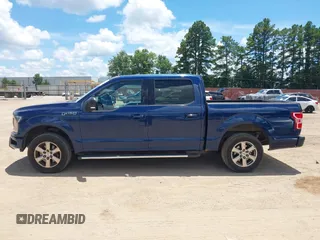 2018 Ford F-150 XL with VIN 1FTEW1CP9JKC48708, listed as a IAAI auction lot 42625137 with 209,479 mi miles and . Bid and sale history available at DreamBid. Image 14.